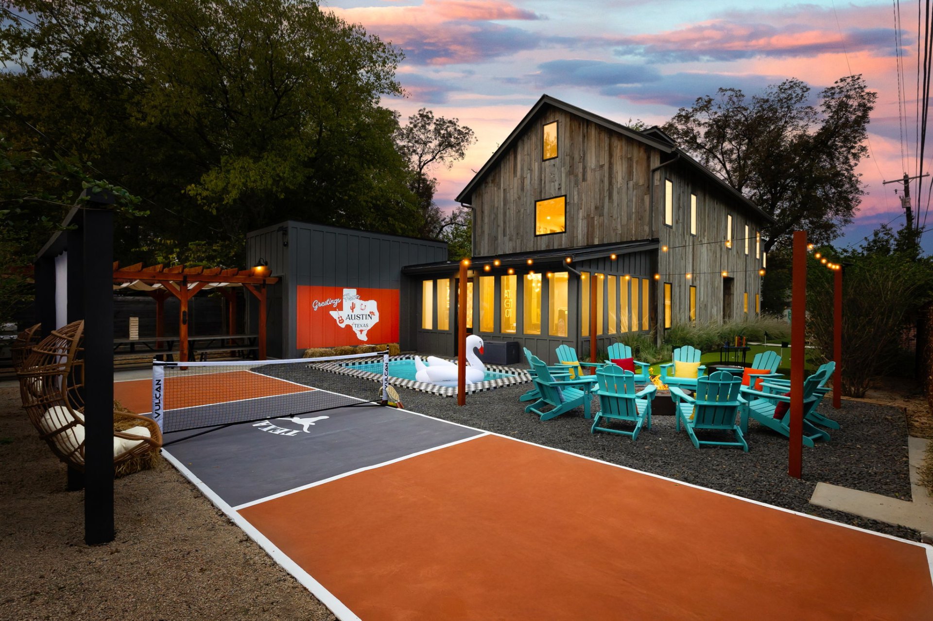 Resort-style private pickleball court at dusk in Texas